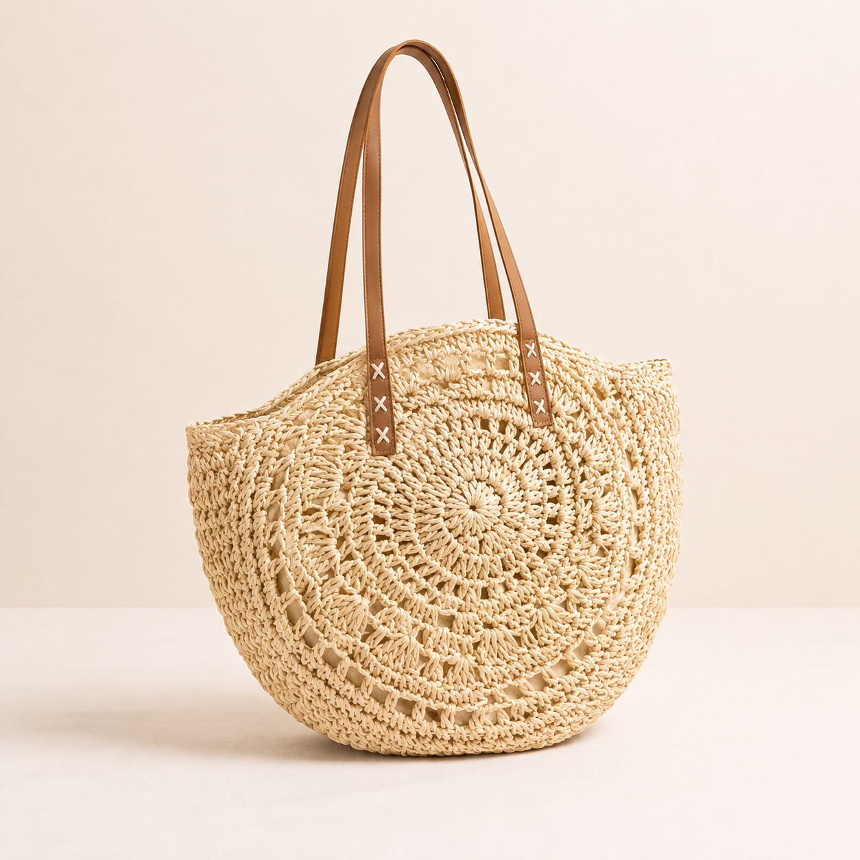 Luigia | Borsa Tonda in Paglia Intrecciata con Motivo — Beige Naturale